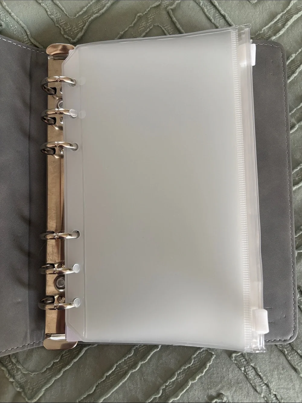 Grey budget binder with zipper pockets and budget tracker sheets